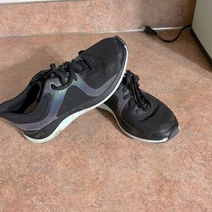 Basically new. Wore two times. Size 7.5. Great shape.